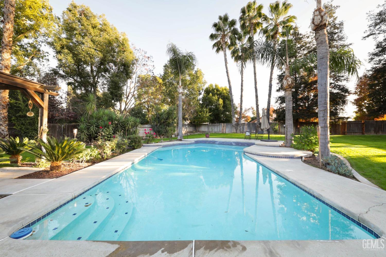 Undisclosed Address Bakersfield, CA 93312 - Photo 28 of 39 a view of swimming pool with a patio
