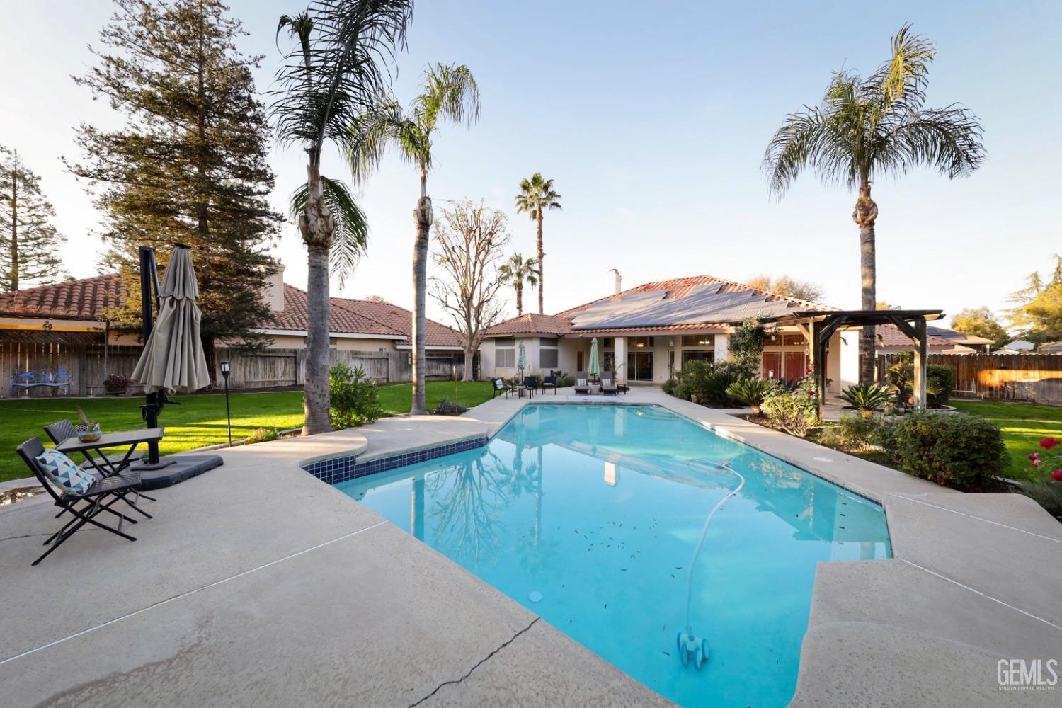 Undisclosed Address Bakersfield, CA 93312 - Photo 30 of 39 a view of a house with swimming pool and sitting area