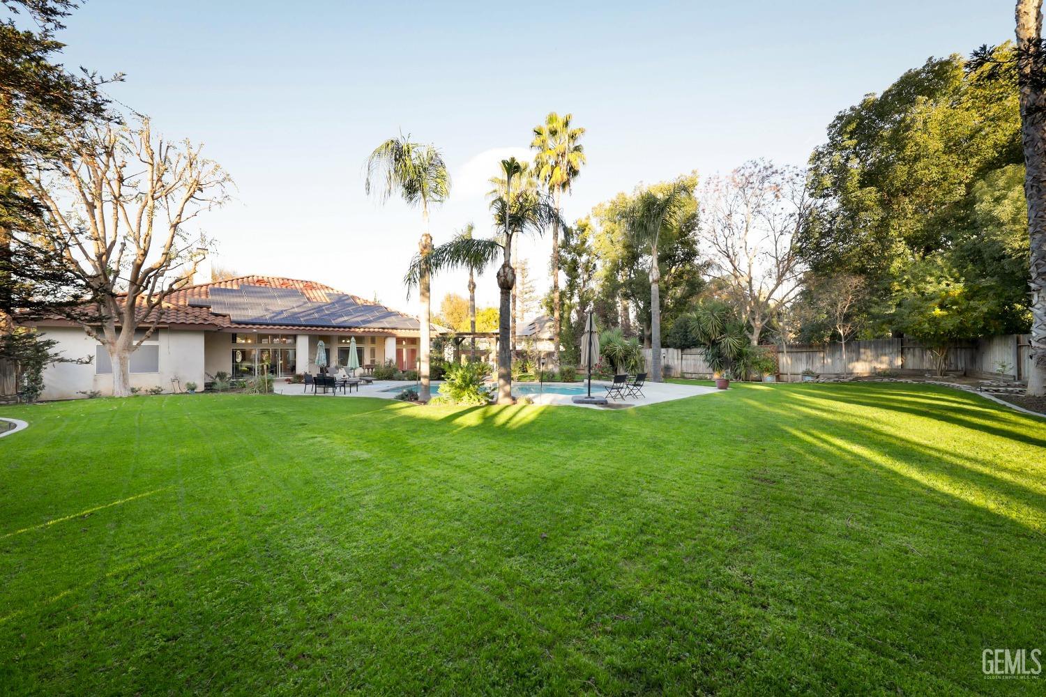 Undisclosed Address Bakersfield, CA 93312 - Photo 3 of 39 a view of a house with a big yard