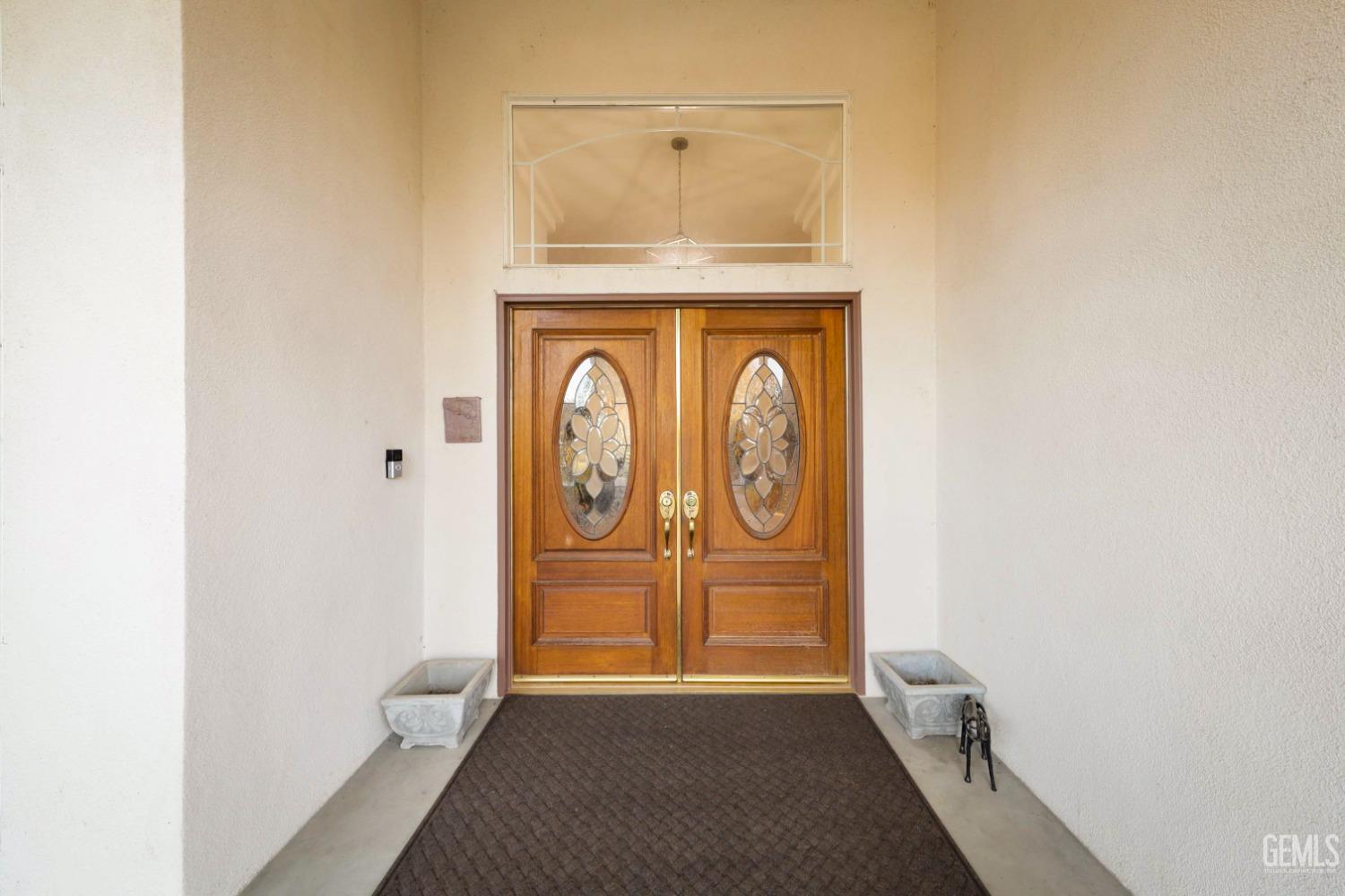 Undisclosed Address Bakersfield, CA 93312 - Photo 35 of 39 a view of front door with wooden floor