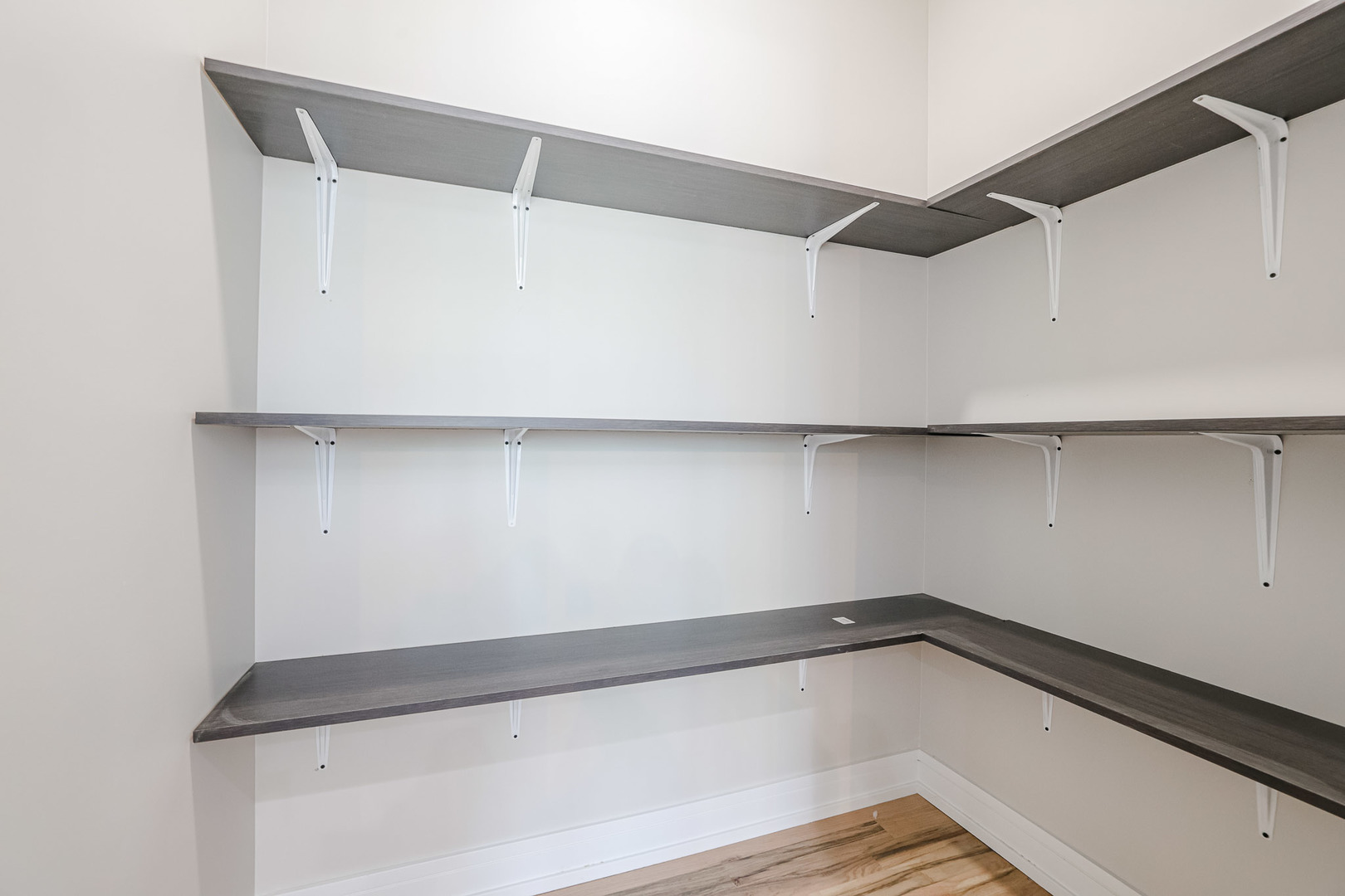 7948 West 74th Avenue Bridgeview, IL 60455 - Photo 14 of 39 a view of an empty walk in closet