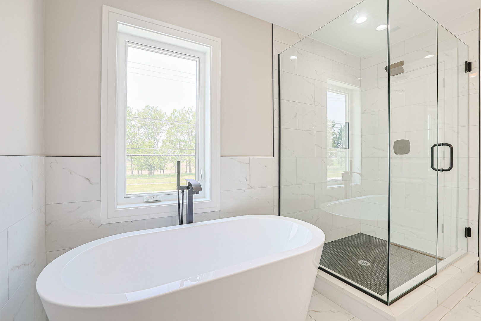 7948 West 74th Avenue Bridgeview, IL 60455 - Photo 30 of 39 a bathroom with a tub and shower