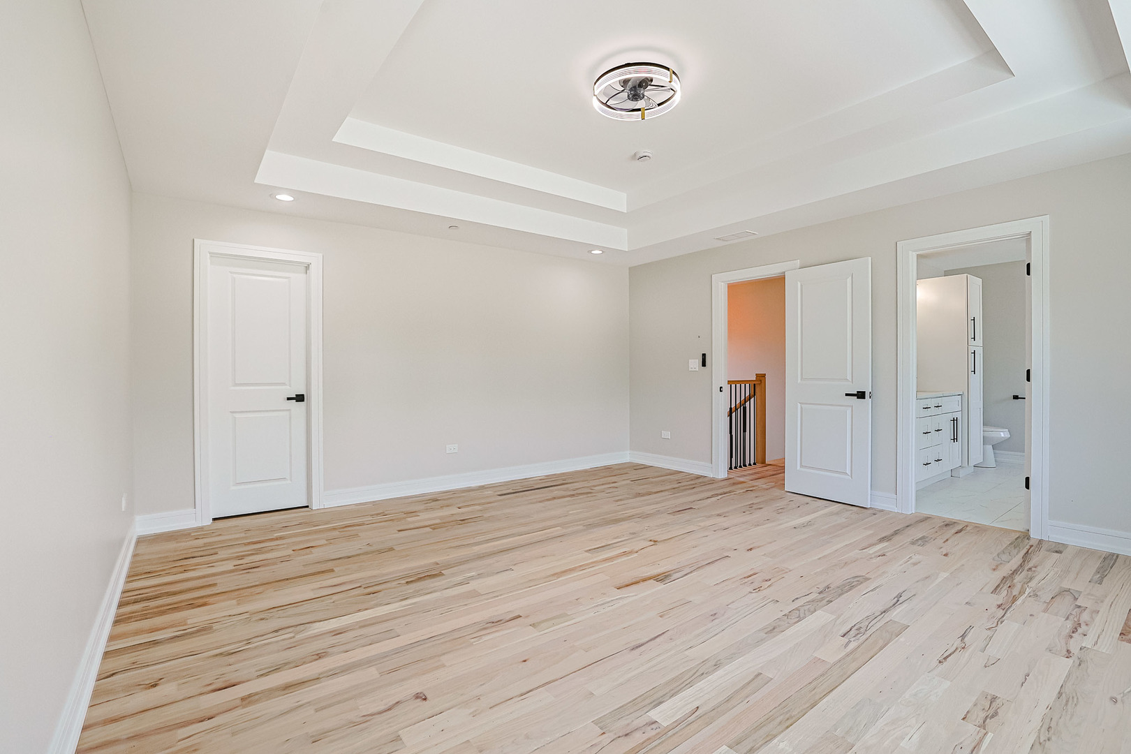 7948 West 74th Avenue Bridgeview, IL 60455 - Photo 34 of 39 a view of an empty room with wooden floor