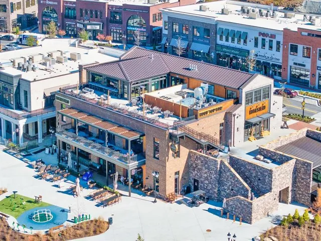 a aerial view of a building with street