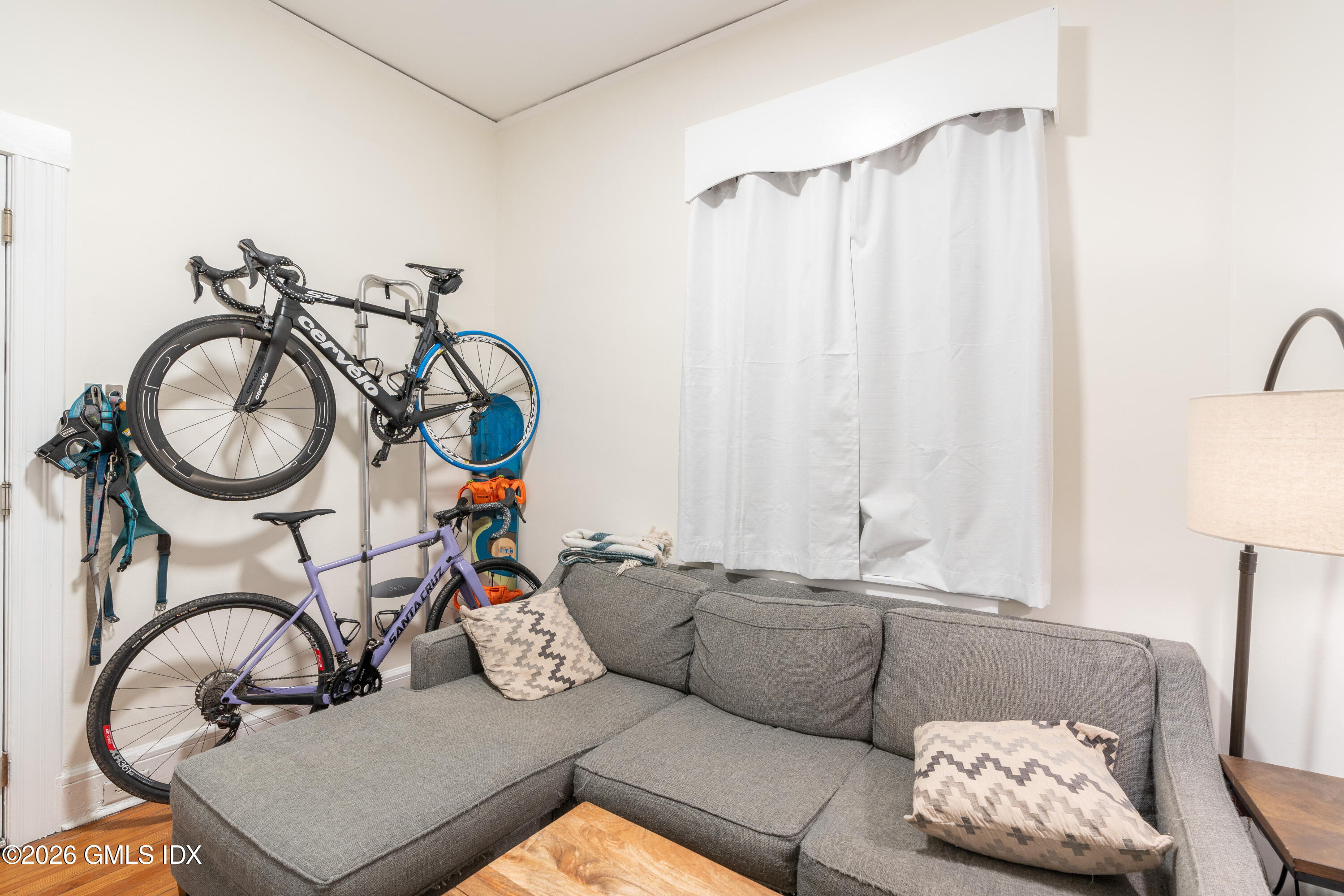 140 Hamilton Avenue, Unit 1 Greenwich, CT 06830 - Photo 5 of 7 a living room with furniture and a window