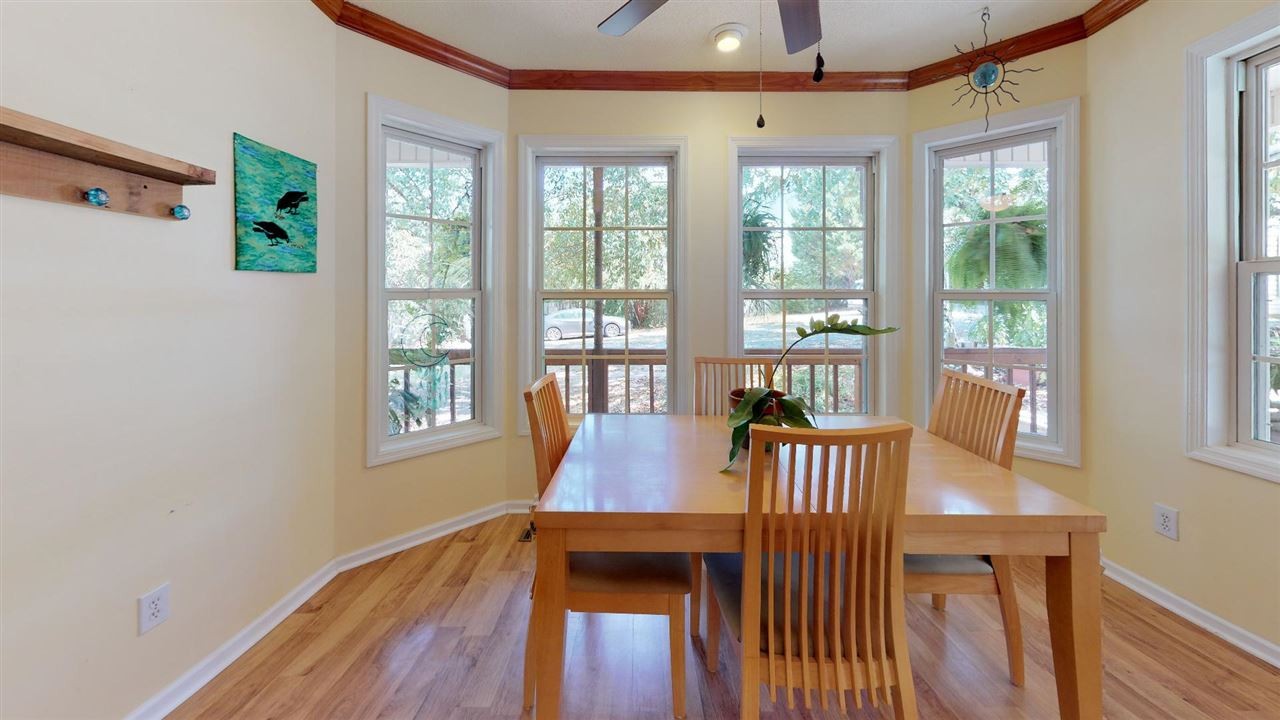 2286 Old Federal Road Ocoee, TN 37361 - Photo 15 of 56 a view of a dining room with furniture wooden floor and a chandelier