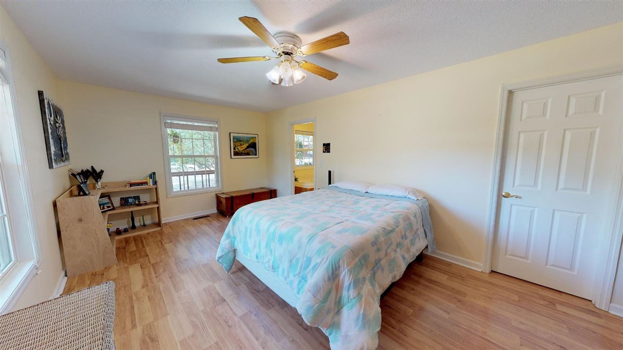 2286 Old Federal Road Ocoee, TN 37361 - Photo 16 of 56 a bedroom with a bed and wooden floor