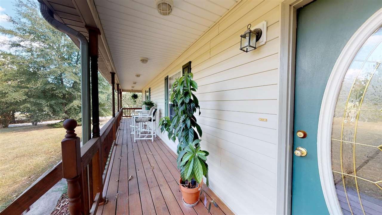 2286 Old Federal Road Ocoee, TN 37361 - Photo 2 of 56 a view of balcony with wooden floor and bench