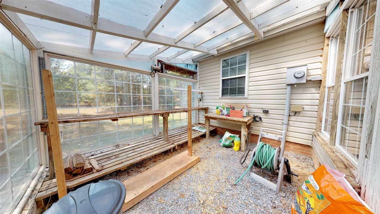 2286 Old Federal Road Ocoee, TN 37361 - Photo 31 of 56 a view of a patio with a table and chairs