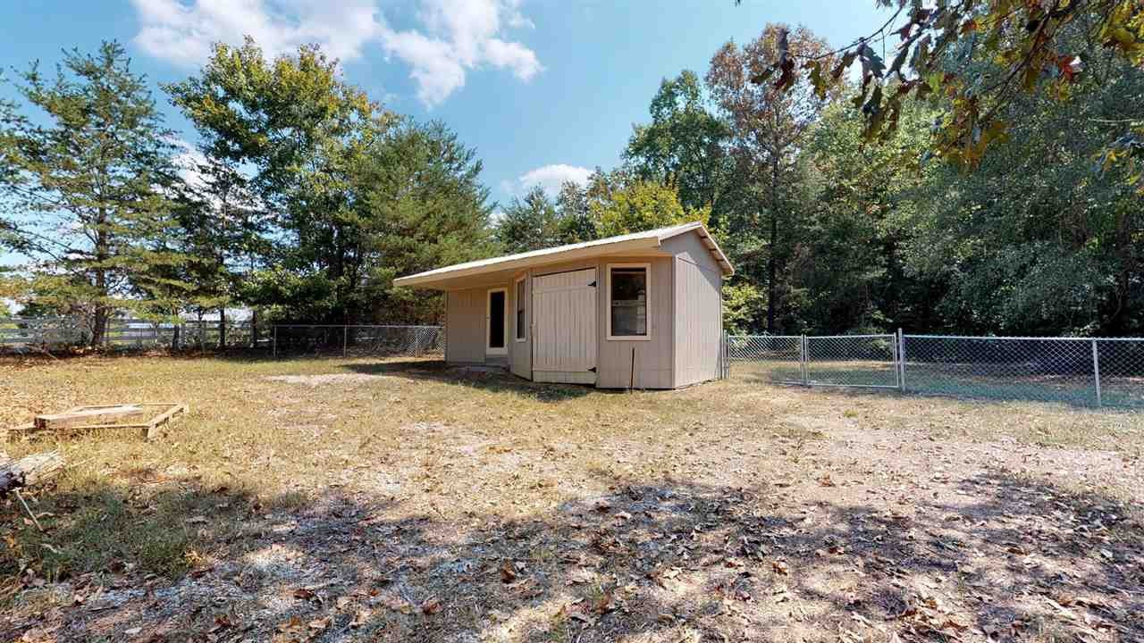 2286 Old Federal Road Ocoee, TN 37361 - Photo 37 of 56 a backyard of a house with lots of green space