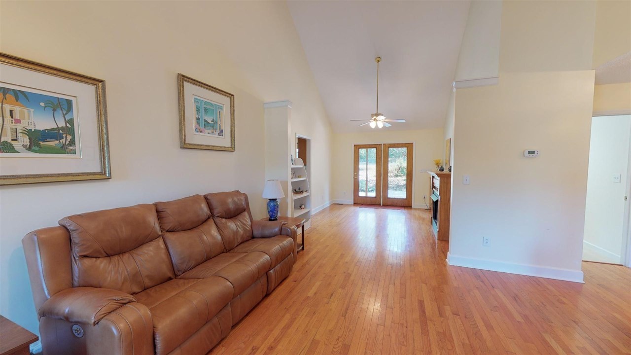 2286 Old Federal Road Ocoee, TN 37361 - Photo 5 of 56 a living room with furniture and a chandelier
