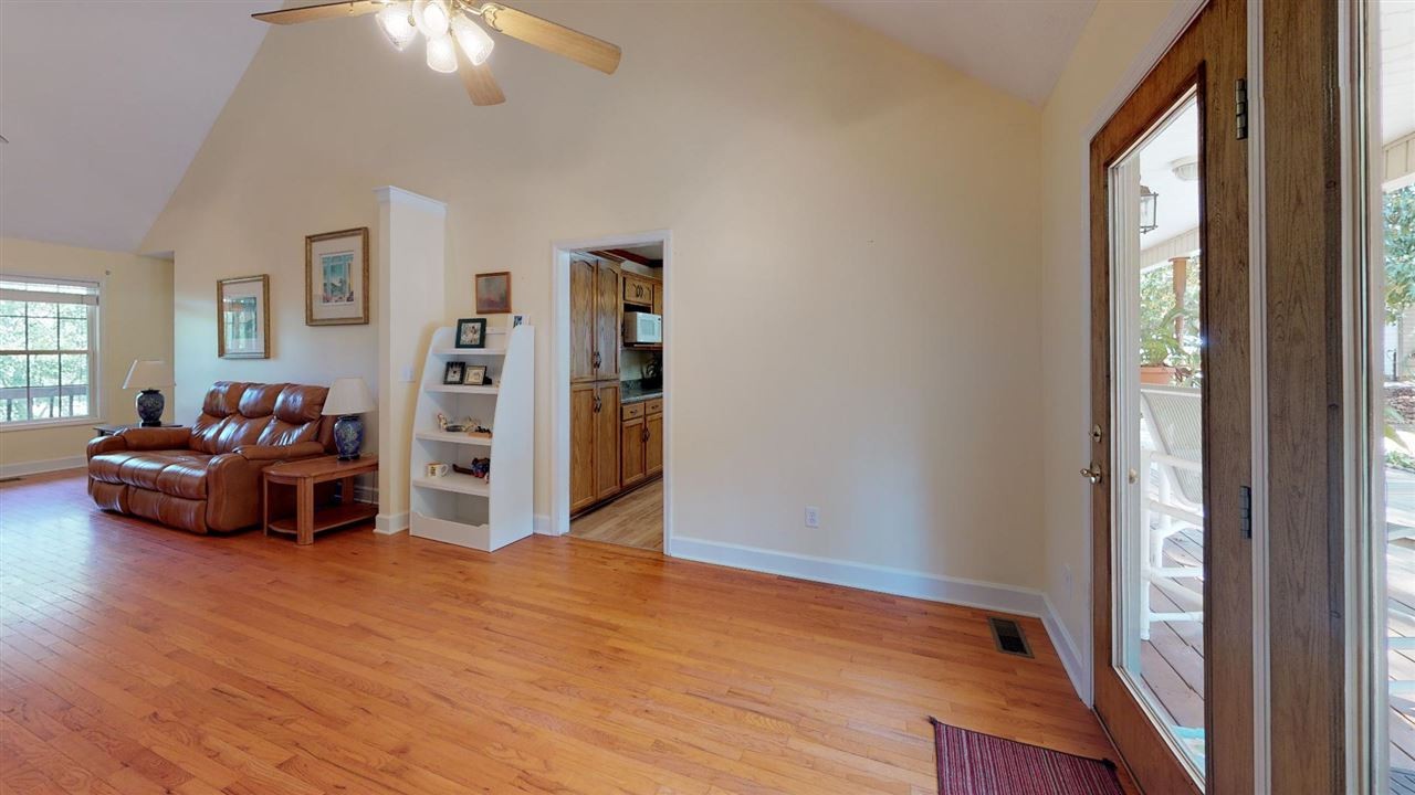 2286 Old Federal Road Ocoee, TN 37361 - Photo 7 of 56 a living room with furniture and a chandelier