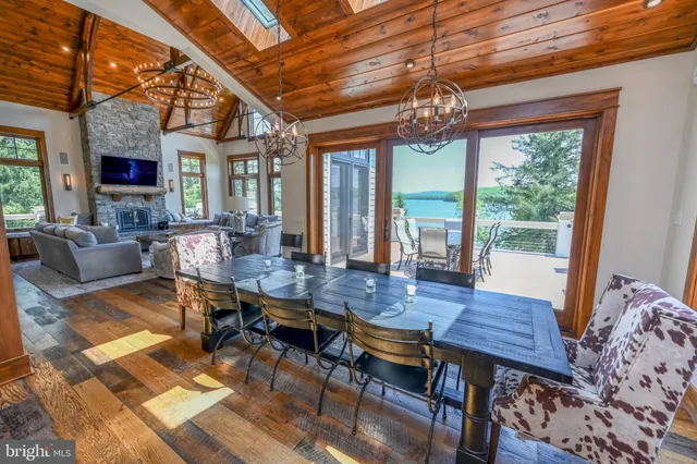 a bedroom with a large bed and a large window