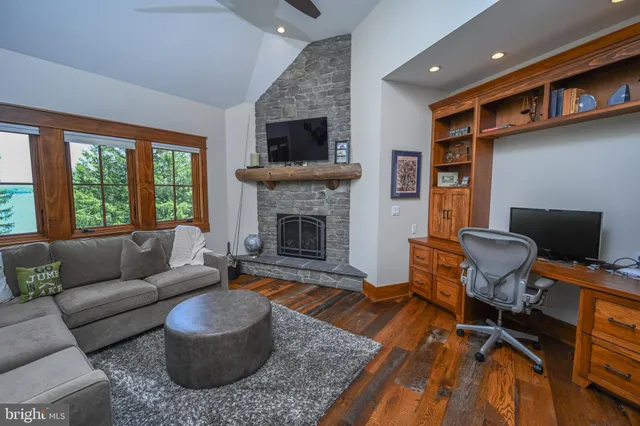 a bathroom with a sink a mirror and a shower