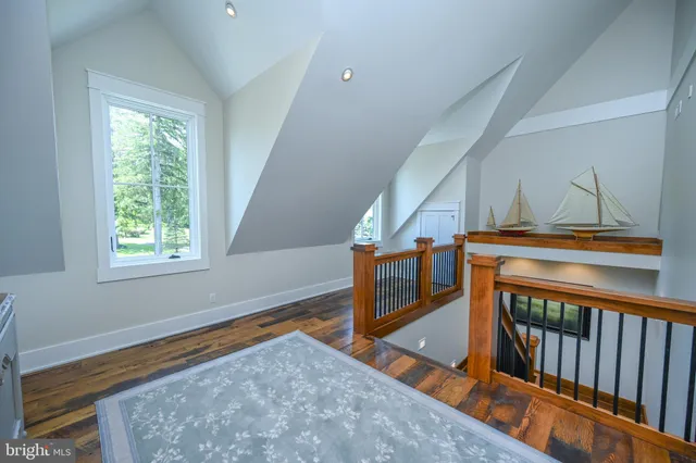 a view of a garden with a building in the background