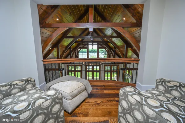 a view of a garden with a building in the background