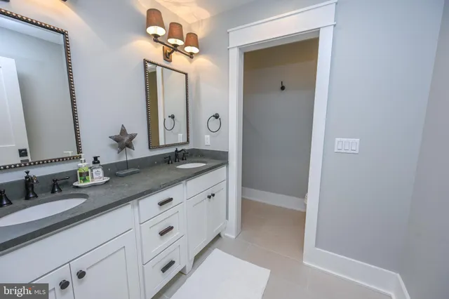 a view of a lake with a house in the background