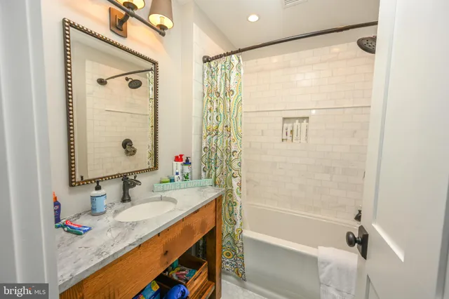 an aerial view of a house with a big yard