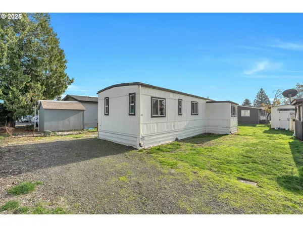 a view of a backyard with a house