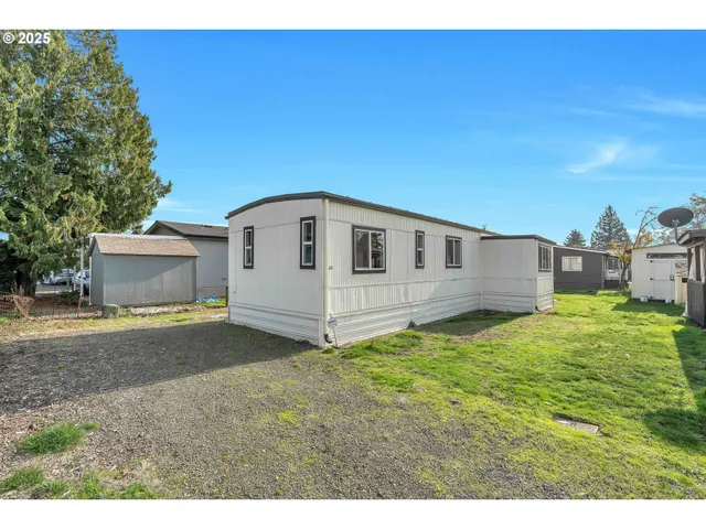 a view of a backyard with a house