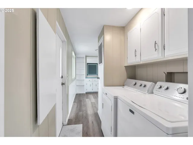 a utility room with dryer and washer