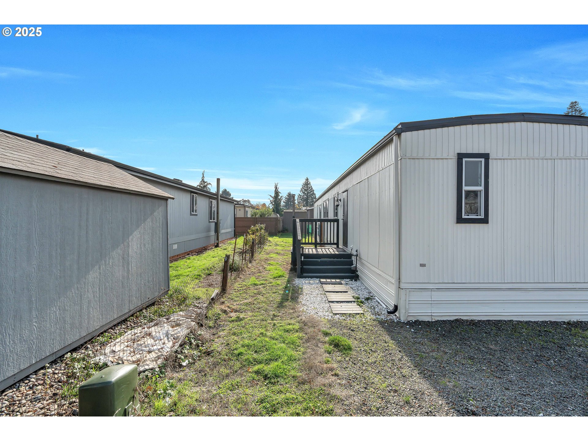 10701 Southeast Highway 212, Unit J3 Clackamas, OR 97015 - Photo 25 of 42 a view of a backyard
