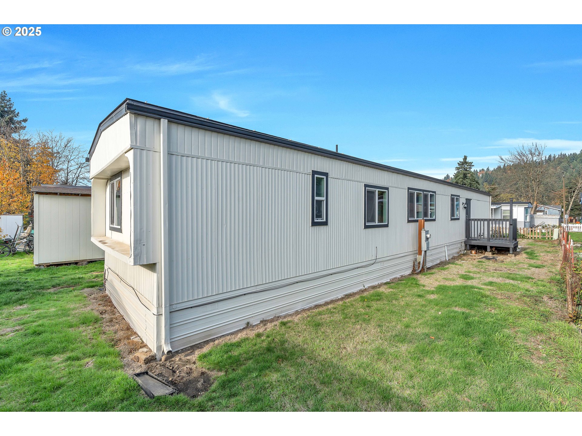 10701 Southeast Highway 212, Unit J3 Clackamas, OR 97015 - Photo 26 of 42 a view of backyard of house