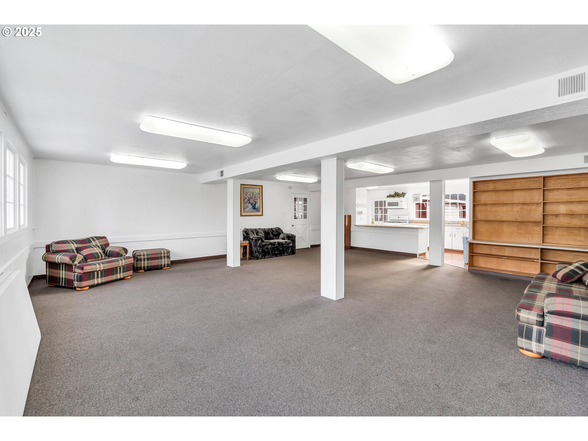 10701 Southeast Highway 212, Unit J3 Clackamas, OR 97015 - Photo 31 of 42 a view of a livingroom with furniture and a window