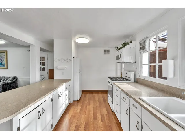 a large kitchen with a lot of counter space