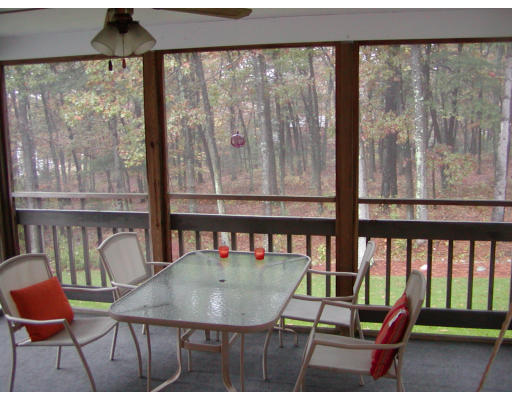 11 Quail Run Road Bellingham, MA 02019 - Photo 21 of 22 a balcony with furniture and a window