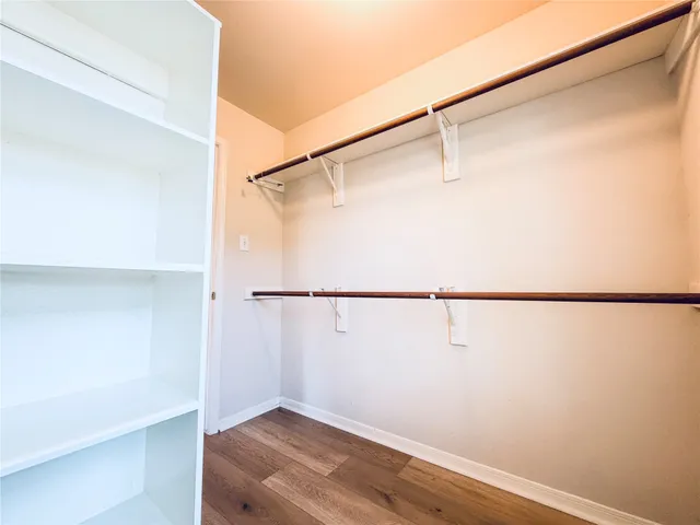 a view of a room with racks on the wall