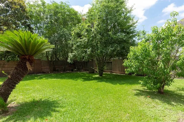 a view of a backyard with a garden