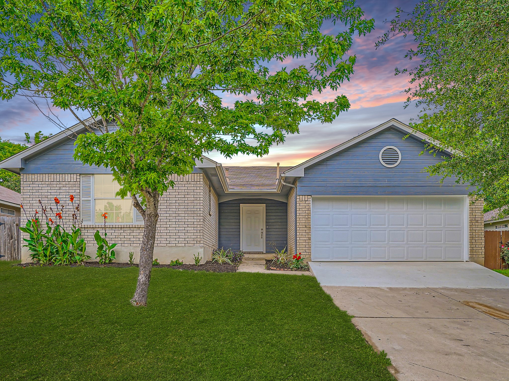 905 Jasmine Trail Georgetown, TX 78626 - Photo 1 of 31 a front view of house with yard and green space