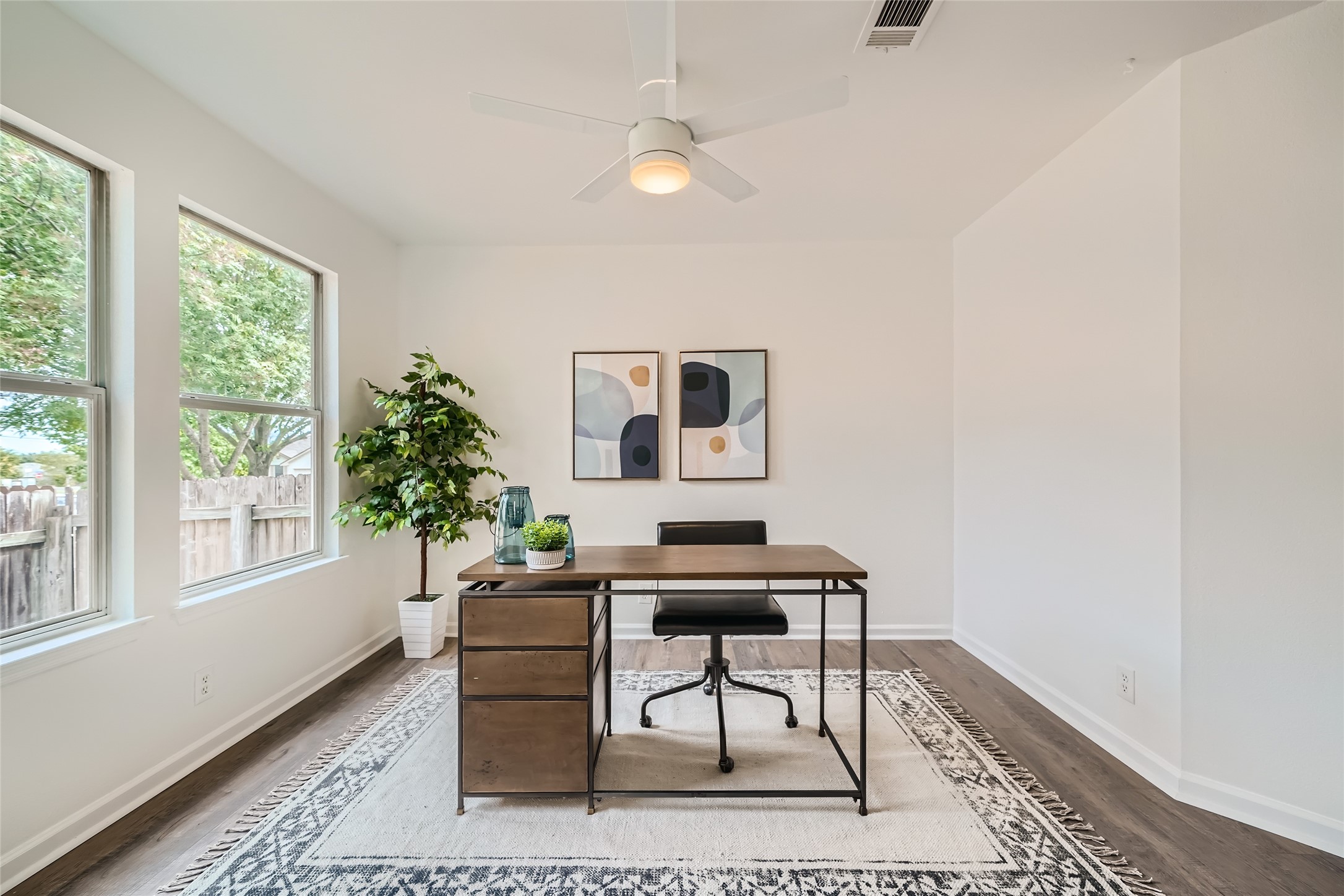 905 Jasmine Trail Georgetown, TX 78626 - Photo 13 of 31 a workspace with furniture and a window
