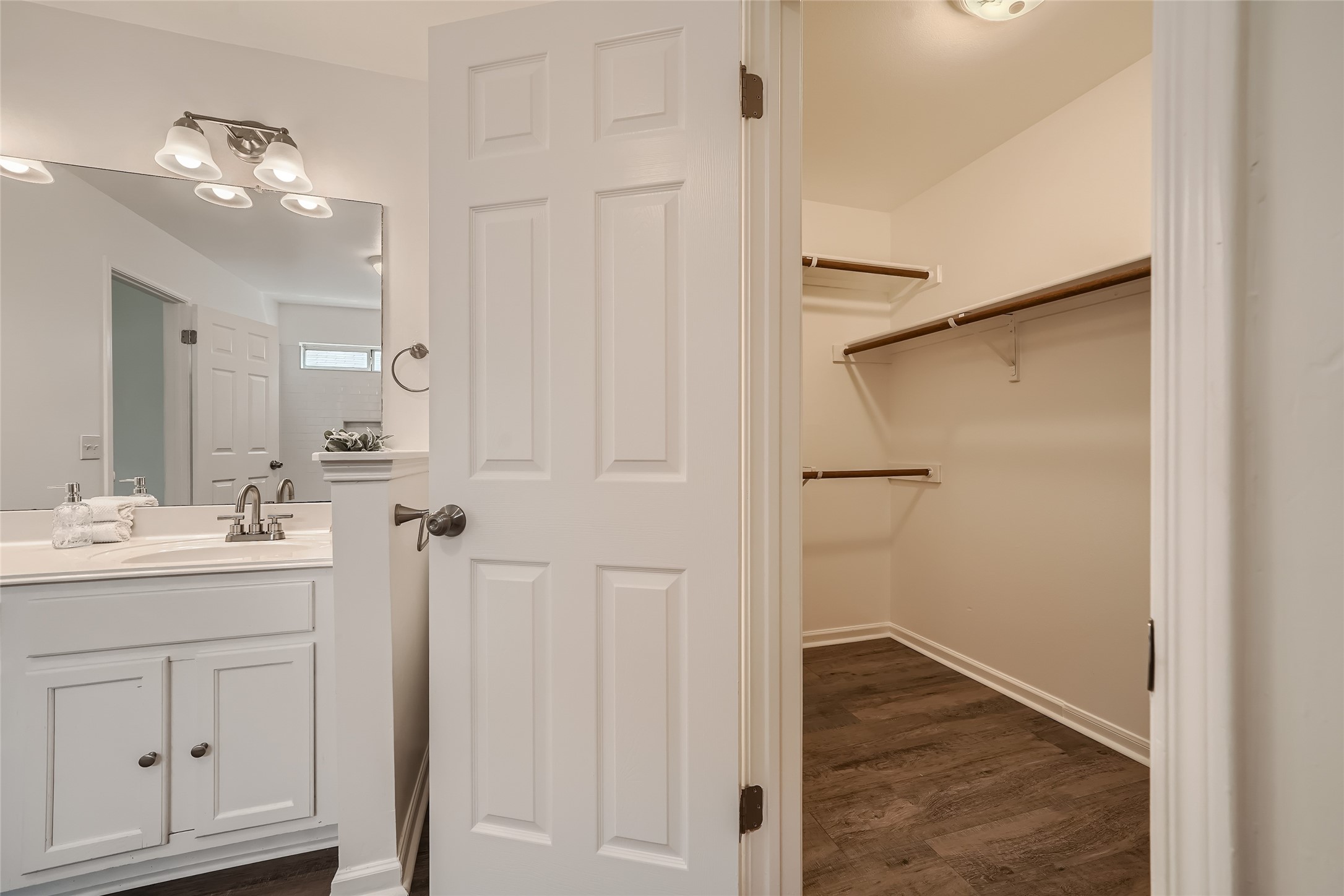 905 Jasmine Trail Georgetown, TX 78626 - Photo 19 of 31 a bathroom with a sink and mirror