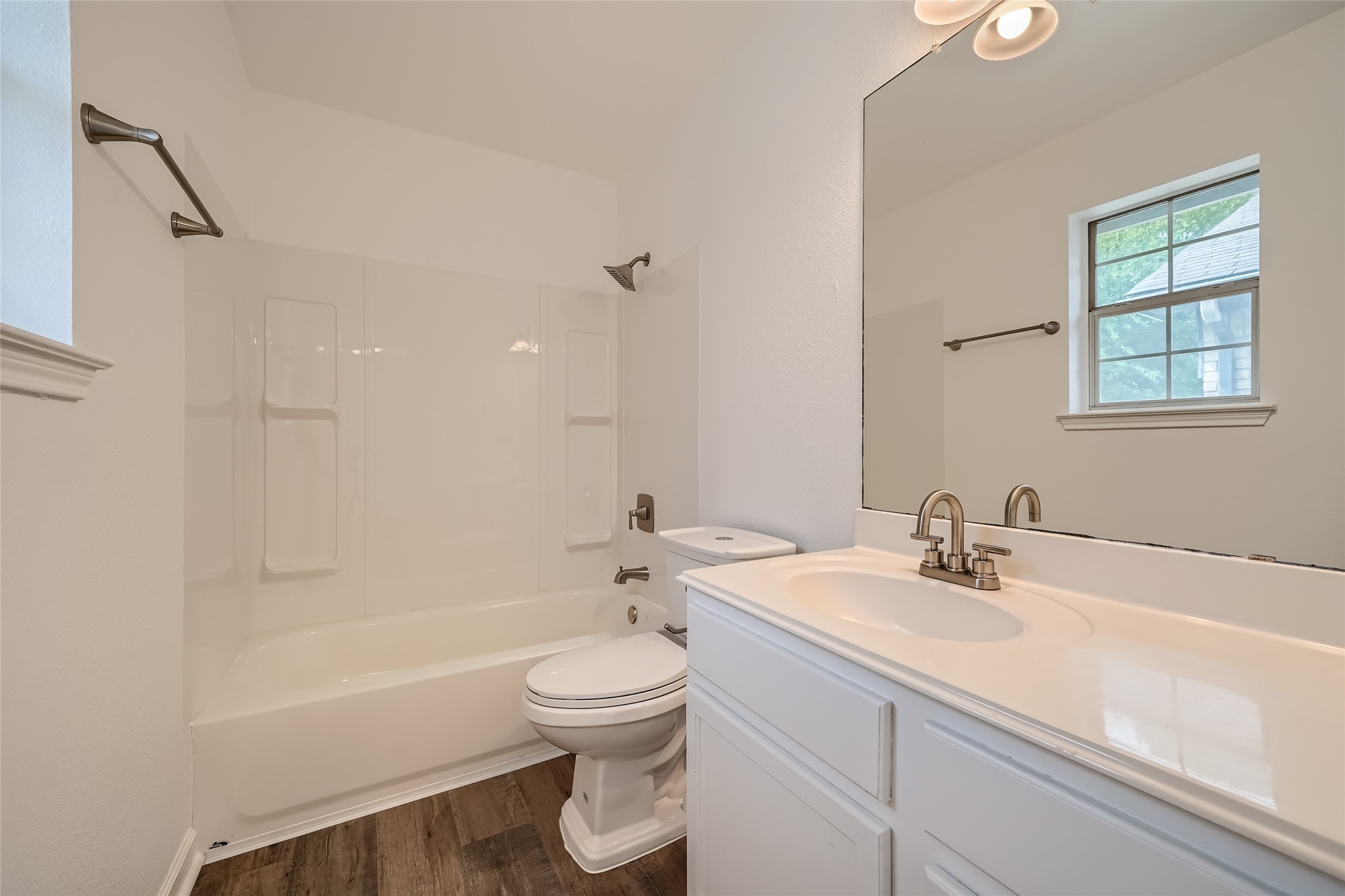 905 Jasmine Trail Georgetown, TX 78626 - Photo 22 of 31 a bathroom with a sink a toilet and a bathtub