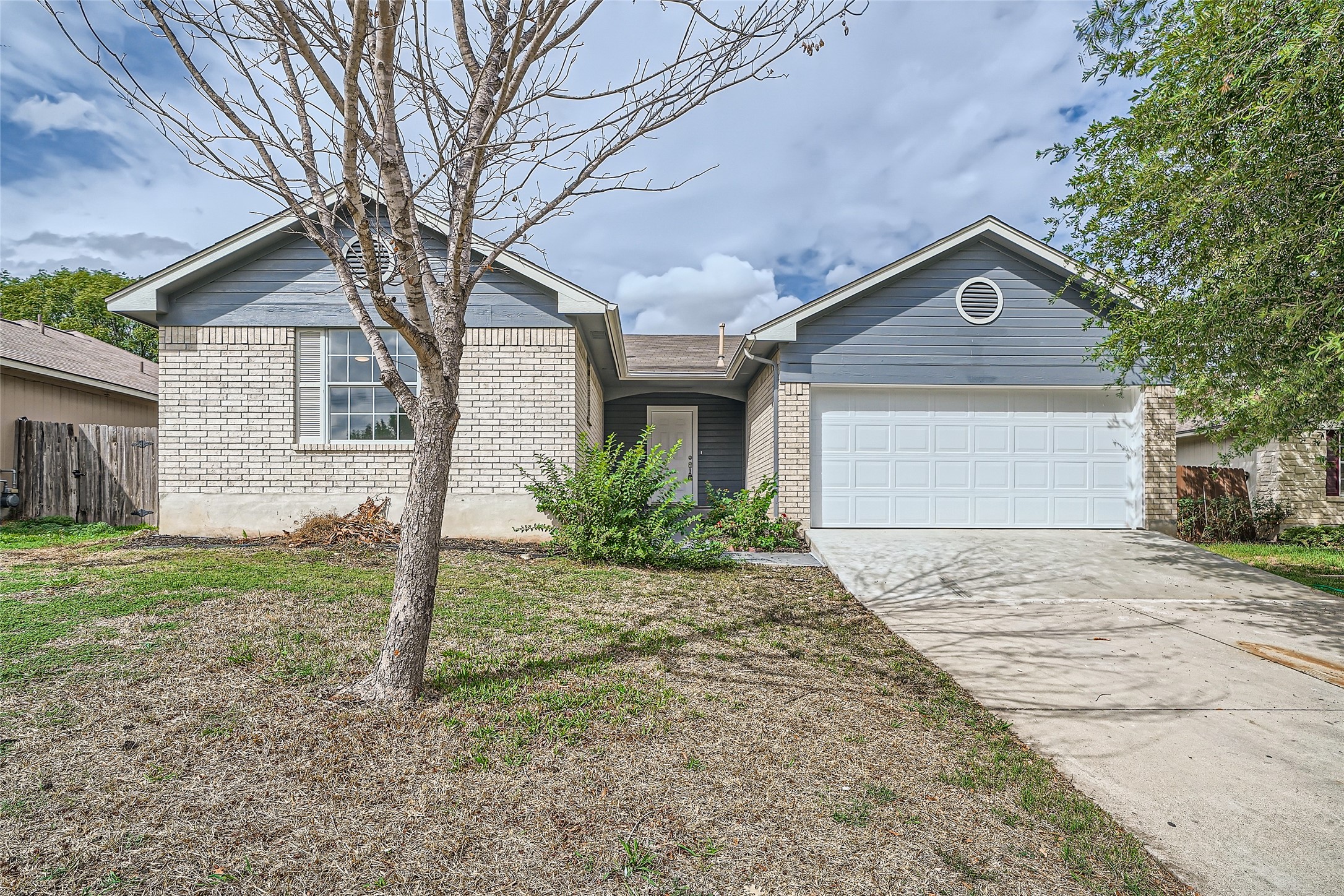 905 Jasmine Trail Georgetown, TX 78626 - Photo 27 of 31 a house with trees in the background