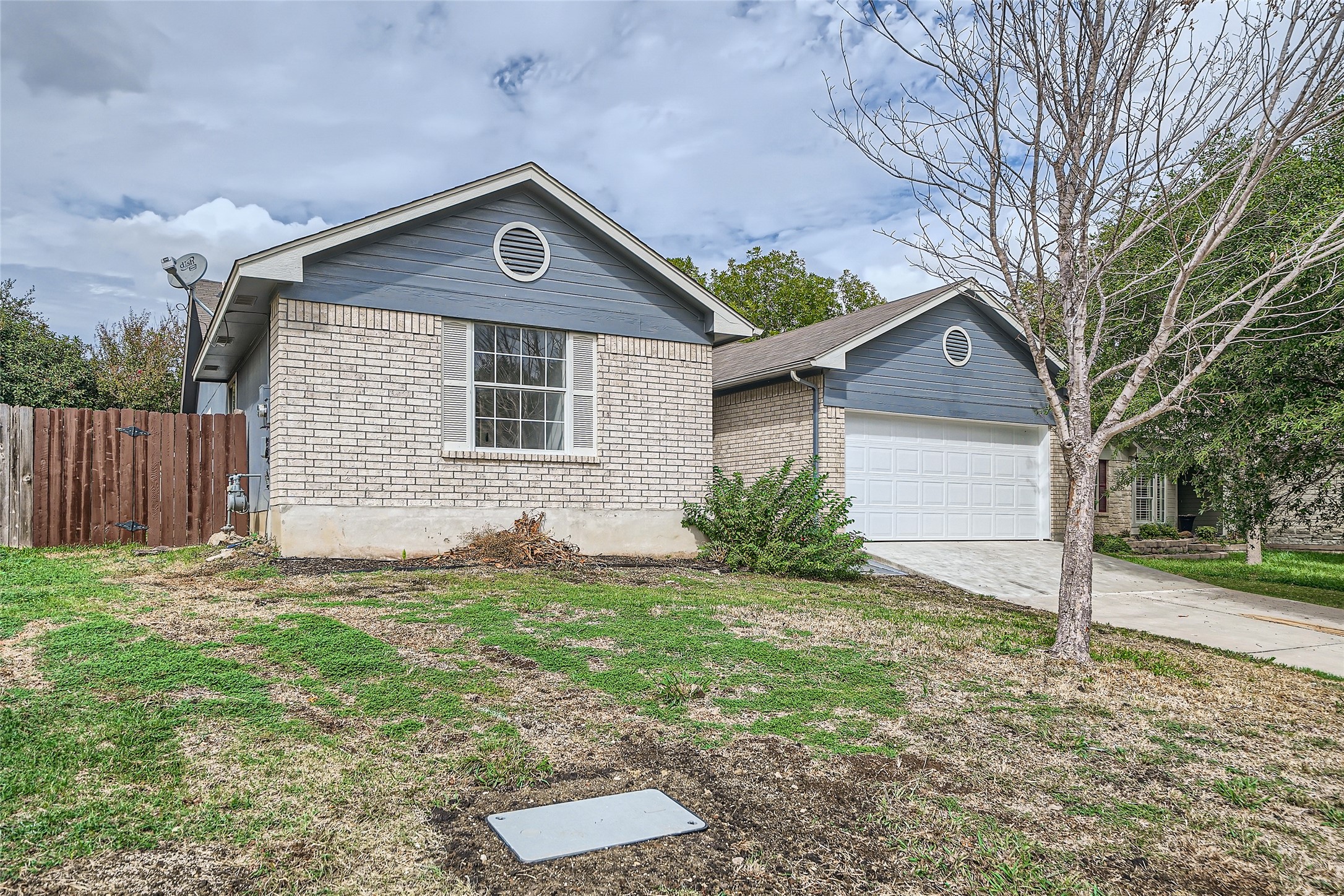 905 Jasmine Trail Georgetown, TX 78626 - Photo 28 of 31 a front view of a house with garden