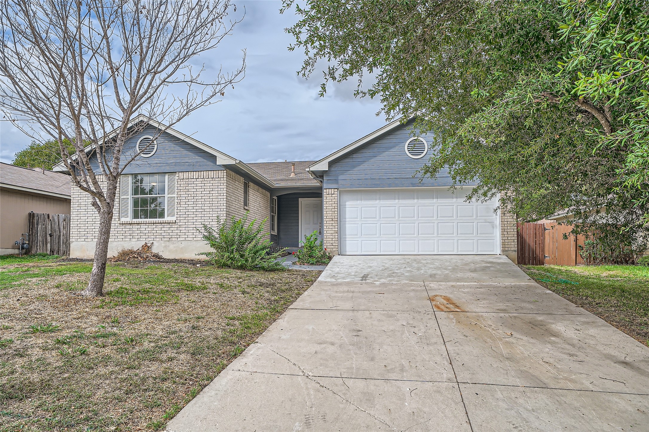 905 Jasmine Trail Georgetown, TX 78626 - Photo 29 of 31 a front view of a house with garden
