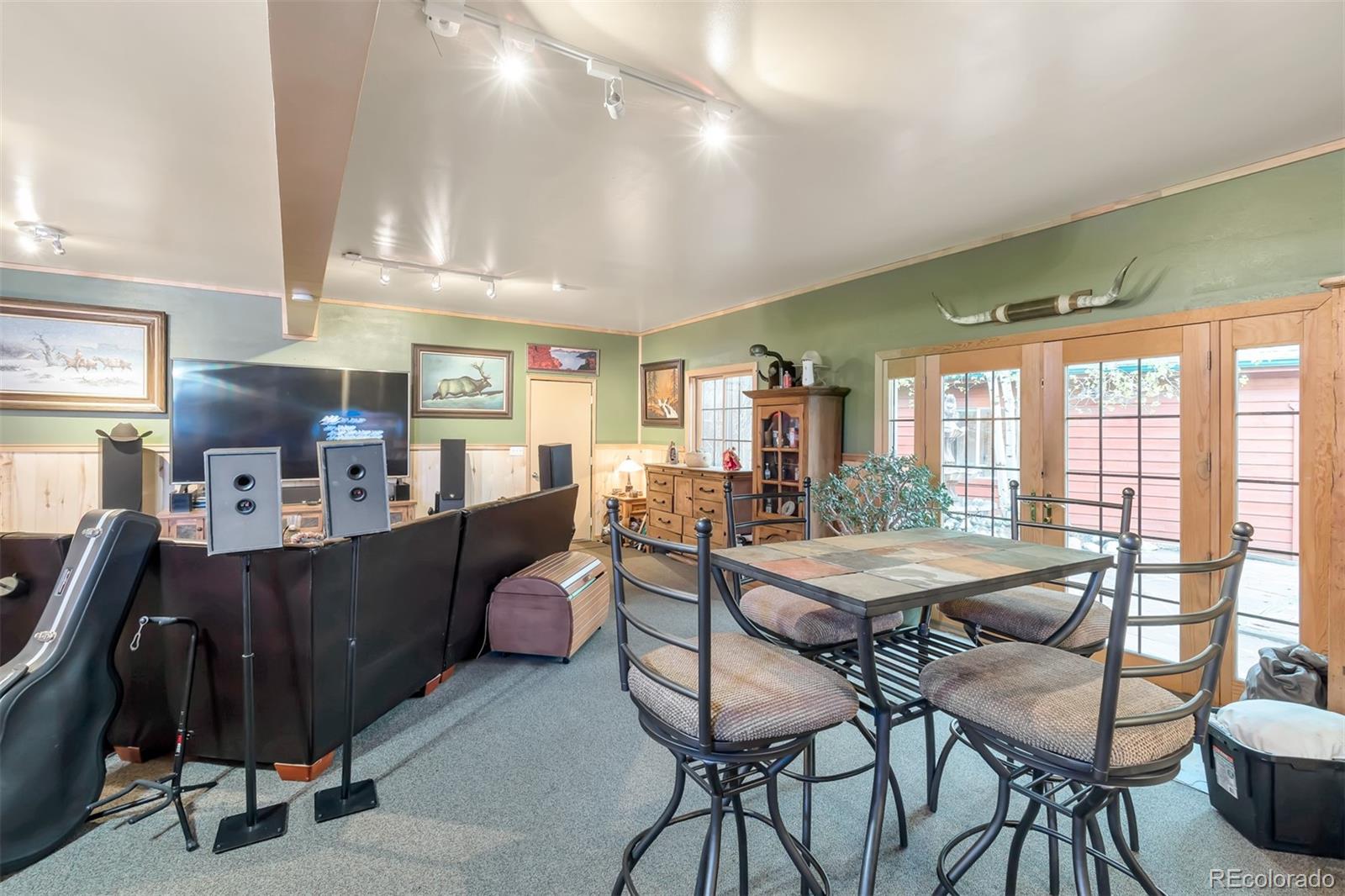 195 Bulldogger Road Bailey, CO 80421 - Photo 23 of 38 a dining room with furniture and window
