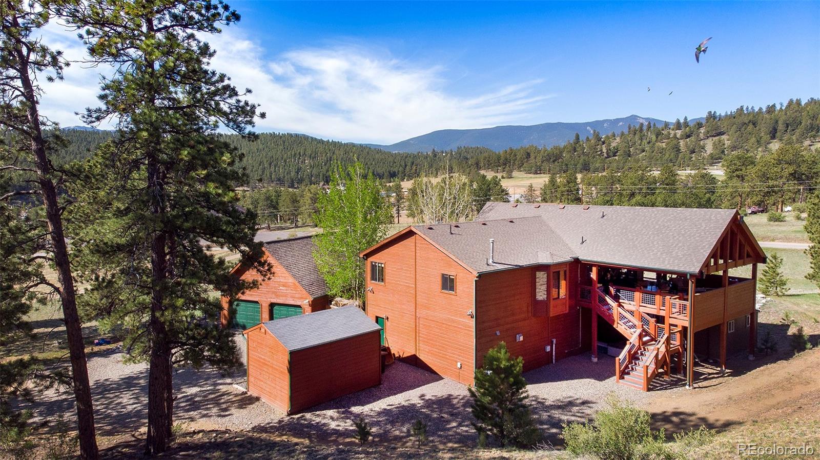 195 Bulldogger Road Bailey, CO 80421 - Photo 4 of 38 an aerial view of a house with a yard