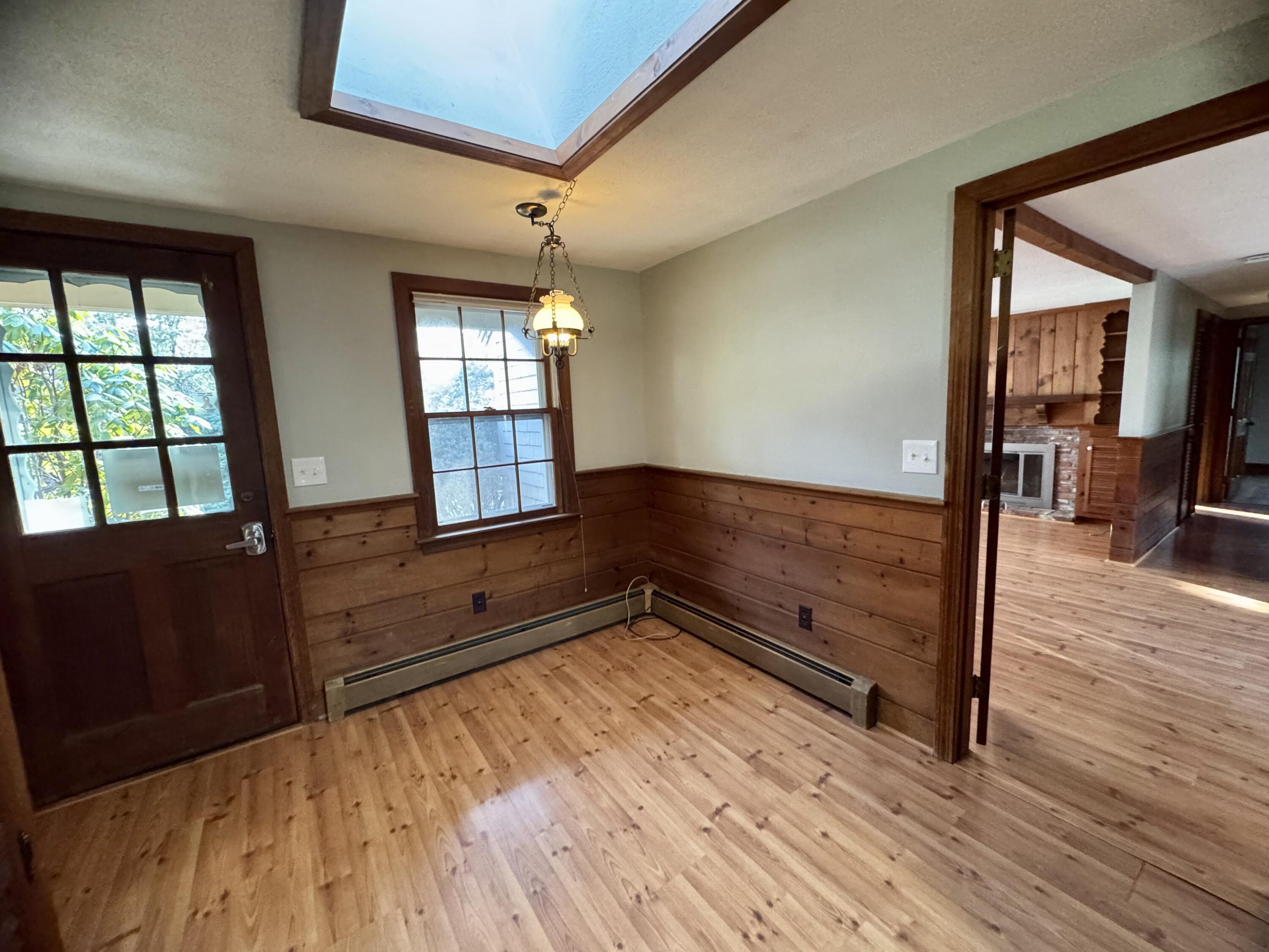 198 Great Marsh Road Centerville, MA 02632 - Photo 8 of 19 a view of an empty room and wooden floor