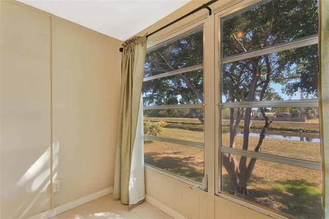 a view of a glass door and porch