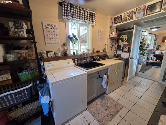 a kitchen that has a lot of cabinets in it