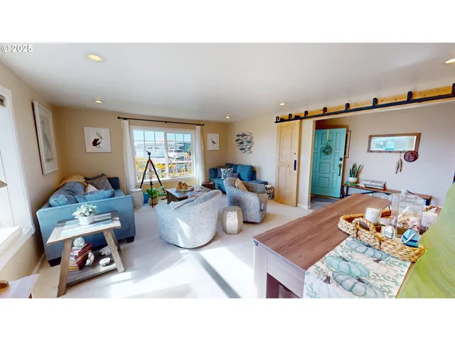 a bedroom with furniture and a wooden floor