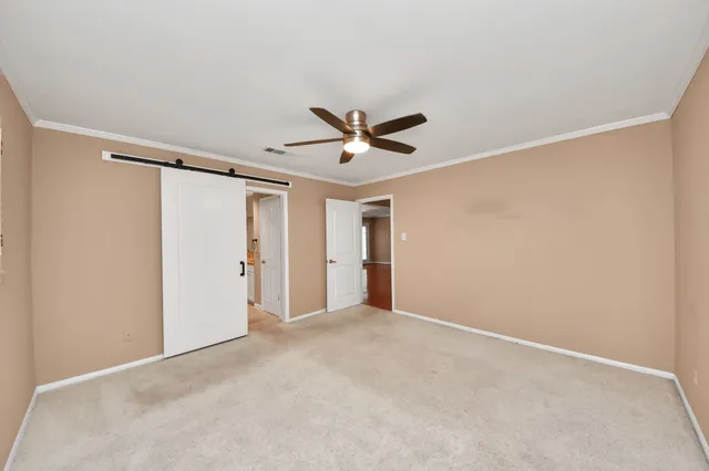 a bathroom with a granite countertop sink mirror and shower