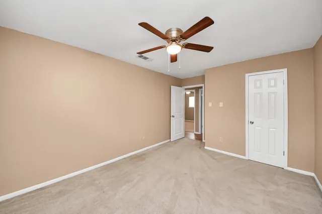 a view of a room with a window