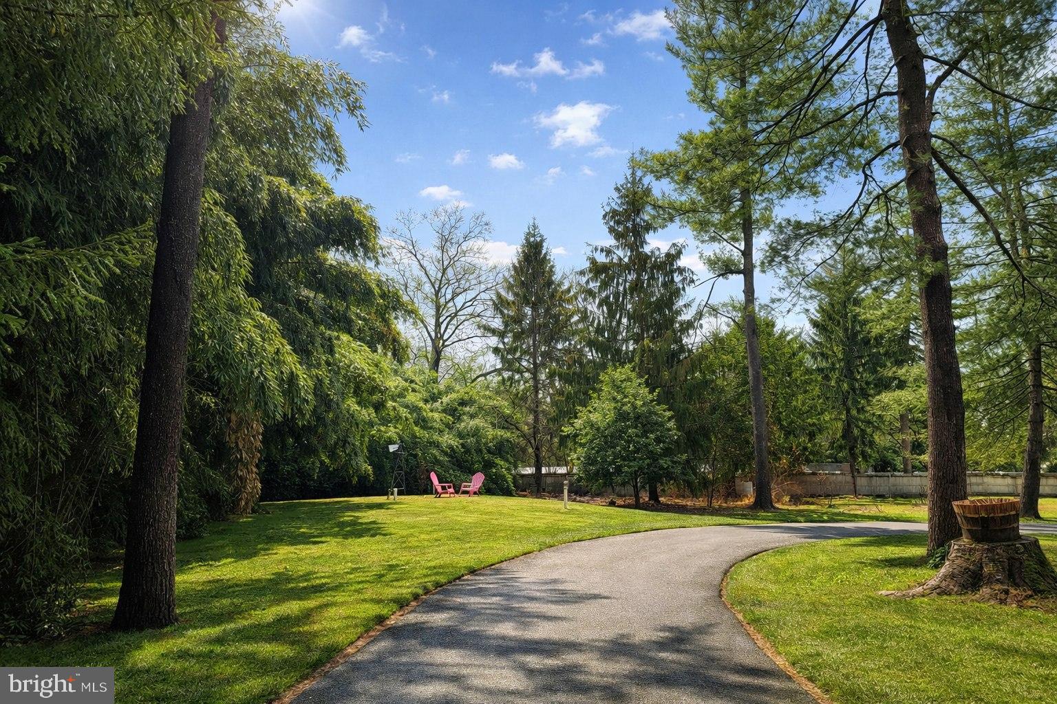 890 Lawrenceville Road Princeton, NJ 08540 - Photo 2 of 8 a view of a golf course with a big yard
