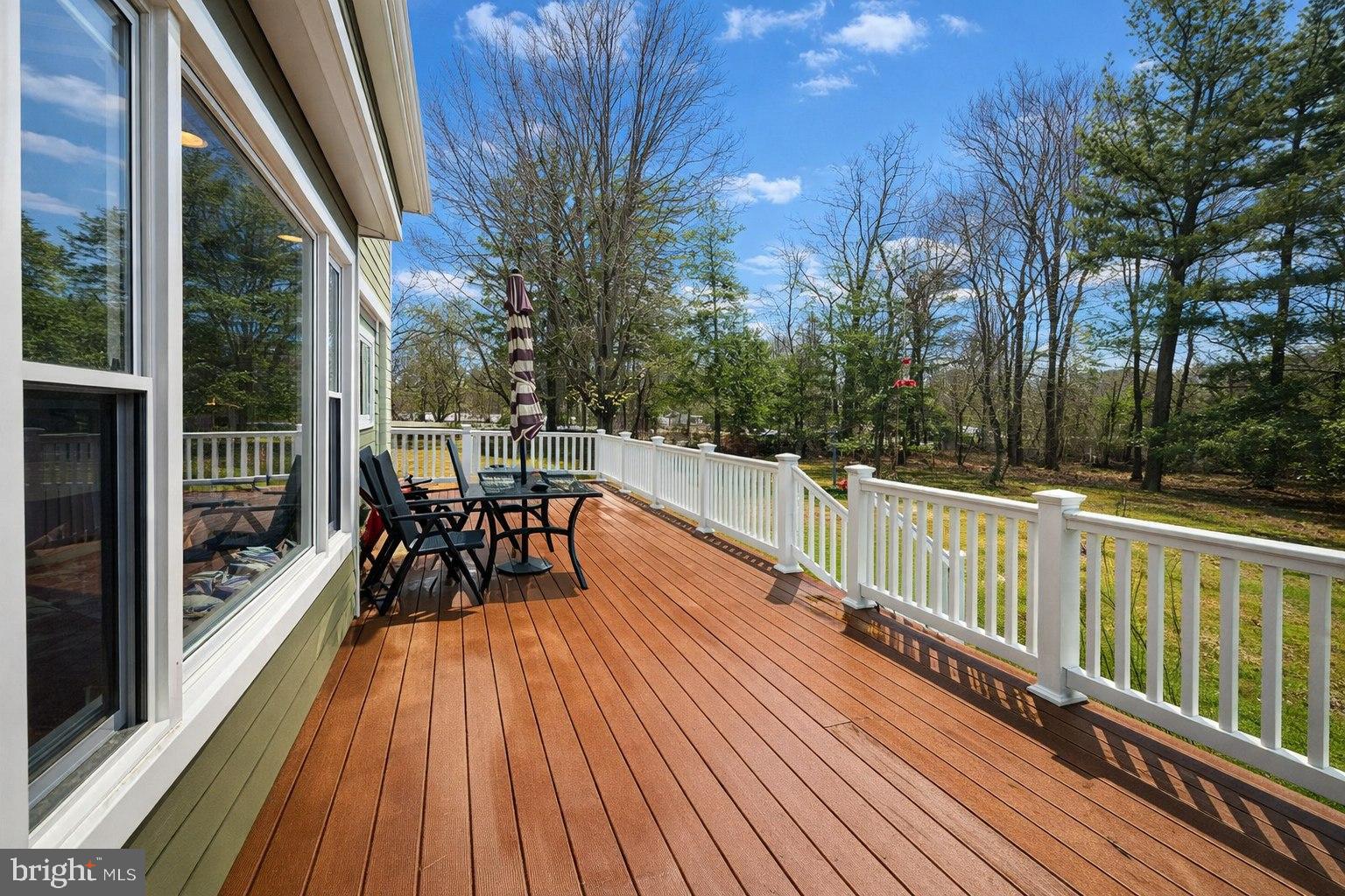 890 Lawrenceville Road Princeton, NJ 08540 - Photo 4 of 8 a view of balcony with chairs and wooden floor