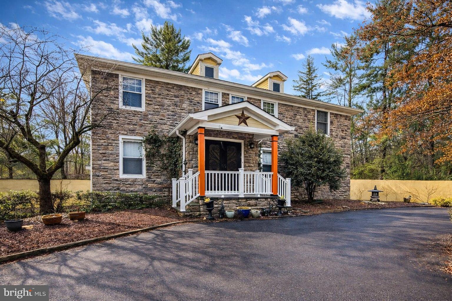 890 Lawrenceville Road Princeton, NJ 08540 - Photo 5 of 8 a front view of a house with a yard